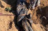 Bodies of two residents tortured by Russian military exhumed in Kherson Region