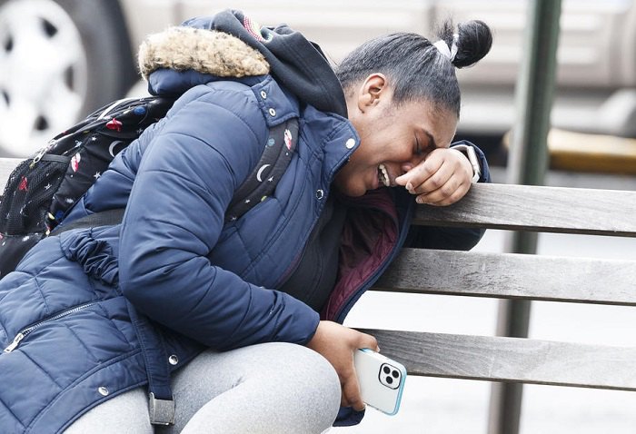 A young New York woman reacts to the death of a relative from coronavirus