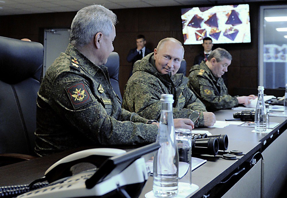 Russian President Vladimir Putin, Russian Defence Minister Sergey Shoygu (right) and Russian Chief of the General Staff Valeriy Gerasimov (left) during the command and staff exercises <i>Vostok-2022</i>, Primorskiy Territory, 6 September, 2022.