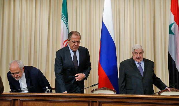 Left to right: Iranian Foreign Minister Mohammad Javad Zarif, Russian Foreign Minister Sergey Lavrov and Syrian Foreign
Minister Walid Muallem at a joint news conference after the talks in Moscow, Russia, 28 October 2016