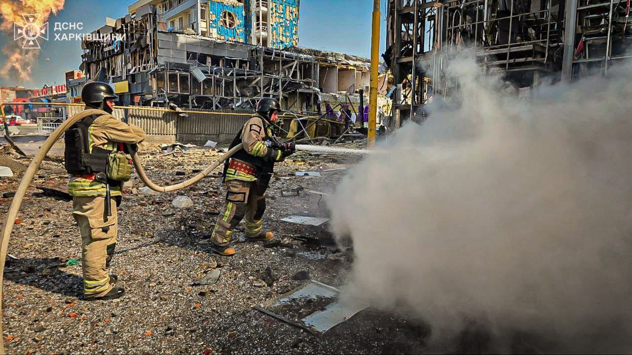 Rescuers at the site of the shelling of Kharkiv on 1 September, 2024