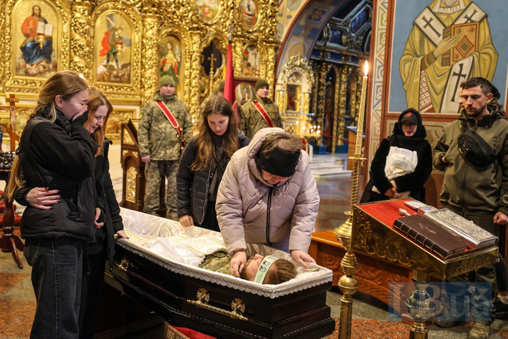 Family and loved ones say goodbye to the deceased Andriy Romanyuk