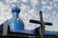 Militants threaten to seize Kyiv-run churches