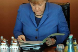 Меркель пригласила Порошенко на ужин