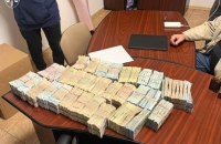 Правоохоронці розповіли подробиці викриття конвертаційного центру в Україні: щомісяця через схему проходило 500 млн грн