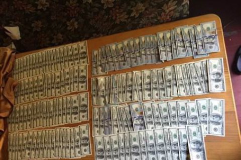 НАБУ изъяло $600 тыс. у доверенного лица Онищенко