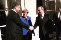 Меркель заставила Путина и Порошенко пожать руки