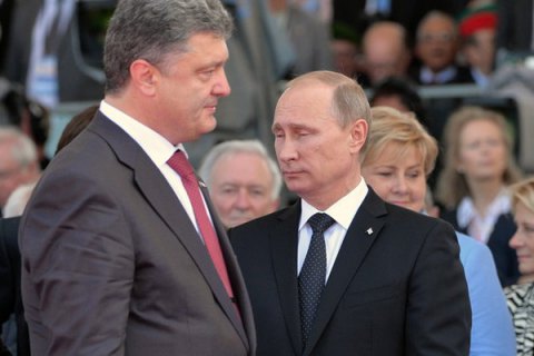 В Киеве появились билборды с Порошенко и Путиным