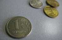 Россиянин расплатился с долгами 16-тью мешками монет