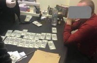 В Одессе топ-чиновника миграционной службы поймали на взятке $10 тысяч
