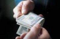 В Днепропетровской области за содействие в усыновлении чиновницы РГА  требовали 5 тыс. грн