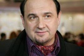 Ющенко уволил своего советника, который пел на съезде Януковича