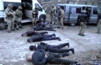 Поліція передала в суд справу 9 членів ОЗУ, які в поліцейській формі грабували людей