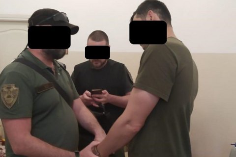 В Запорожье командир взвода подозревается в получении взятки за выдачу удостоверения УБД