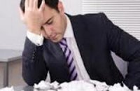 Более половины офисных работников в Украине считают себя трудоголиками