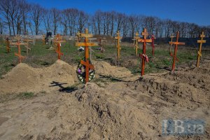 На месте захоронений под Донецком работают международные наблюдатели
