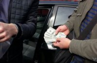 В Киеве у клиентов "менял" неизвестные отобрали 25 тыс. долларов