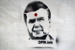 В Киеве задержали нескольких человек за красную точку на лбу Януковича