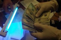 Офицер Херсонского военкомата задержан при получении $600 взятки