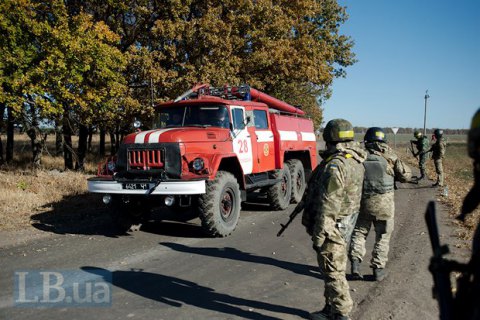 В Сватово продолжают рваться снаряды: пожар на складе локализован
