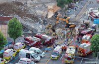 В Южной Корее пятиэтажка рухнула на пассажирский автобус