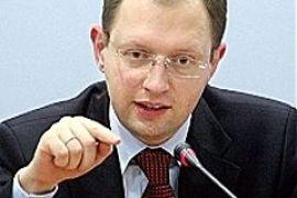 Яценюк пообещал купить Тимошенко стиральную машинку