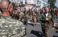 Четырем боевикам предъявили подозрения за "парад пленных" в Донецке