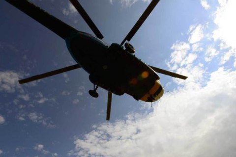 Над Кремлем помітили вертольоти, які несли на тросі вантаж з живими людьми