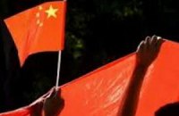 Чиновник в Китае потерял высокий пост из-за улыбки и дорогих часов