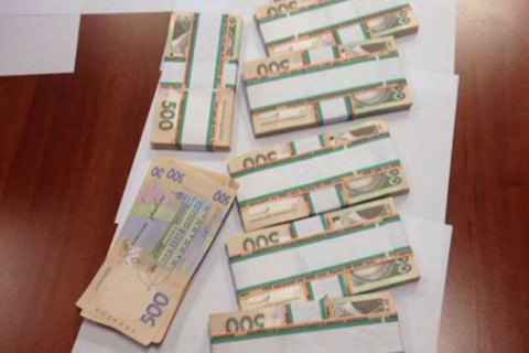 В квартире одного из руководителей центра ВНО обнаружили $134 тыс., €3 тыс. и 80 тыс. грн