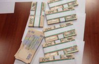 В квартире одного из руководителей центра ВНО обнаружили $134 тыс., €3 тыс. и 80 тыс. грн