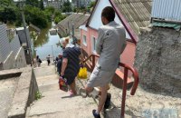 Росіяни обстрілюють Херсон під час евакуації людей із зони затоплення (доповнено)
