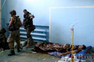 Комбат "Донбасса" просит Красный Крест помочь с вывозом раненых из Иловайска