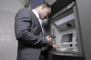 Британия собирает благотворительность через банкоматы