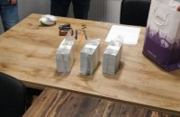 Зять председателя поселкового совета в Киевской области с сообщником требовал 600 тыс. долларов за содействие в выделении земли