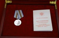 Путин наградил Ким Чен Ына медалью