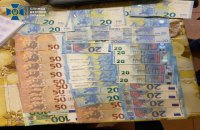 На Київщині затримали фальшивомонетників, які хотіли збути підробки на 20 млн грн