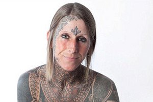 В честь развода британка покрыла татуировками 85% тела