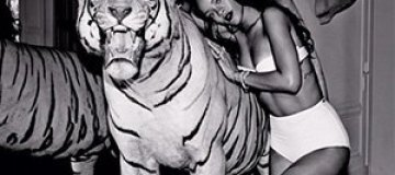 Полуголая Рианна обнимается с тигром